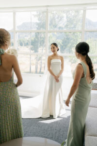 Laughing bride at first look 