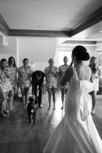 Bride during first look with her friends at Beanos Cabin wedding